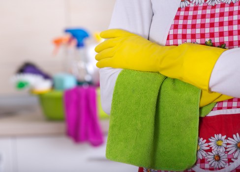 Cleaning technician treating mattress stains in Perivale