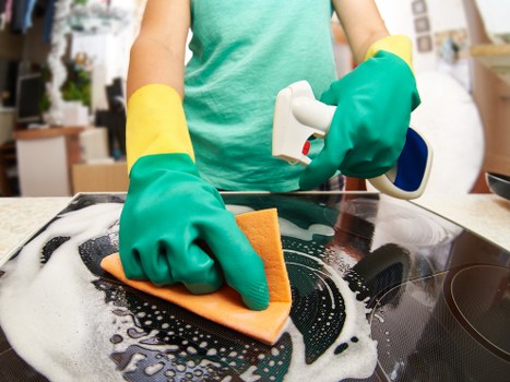 Specialist cleaning equipment being used on a carpet surface
